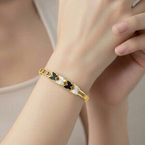 Exquisite Geometric Black and White Butterfly-Accented Stainless Steel Bracelet